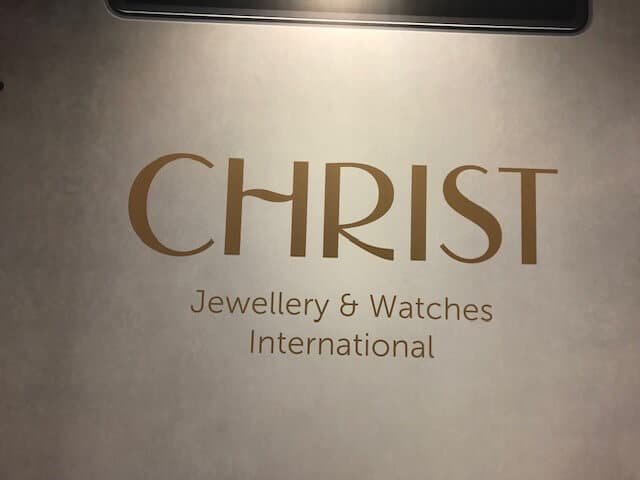 sign on a wall reads "CHRIST jewellery and watches"