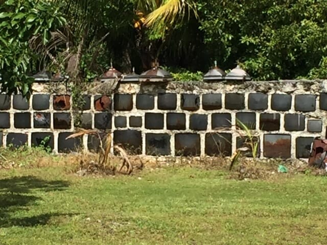 An outside wall built using old televisions